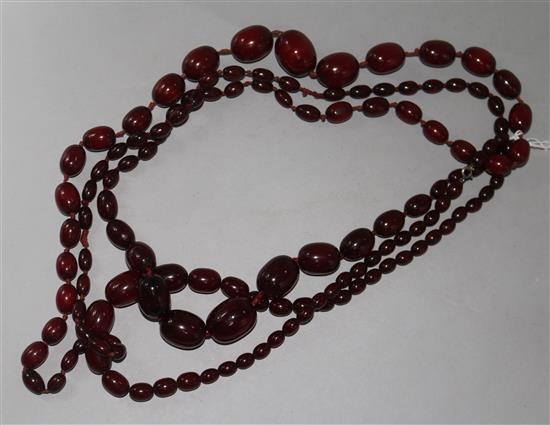Three red amberoid bead necklaces